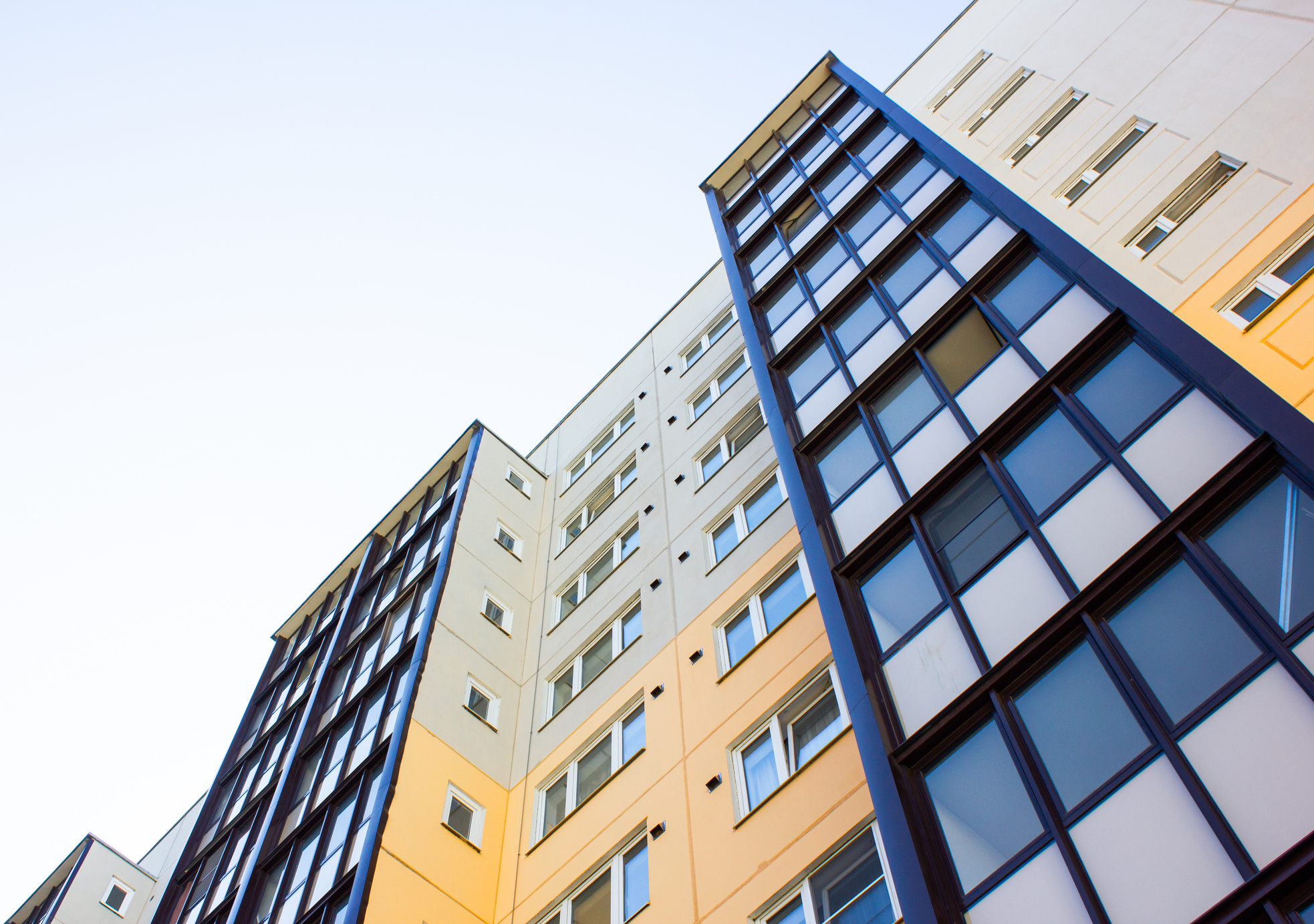 Architectural design of apartment buildings. External view of a new building, residential building, apartments. Modern houses, apartments.Facade of a high-rise apartment